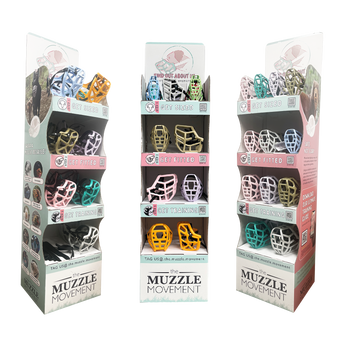Three display boxes of 'The Muzzle Movement' products on a white background