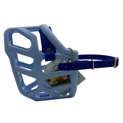 The Muzzle Movement Baby Blue Taz dog muzzle with dark blue straps and nickle hardware on a white background