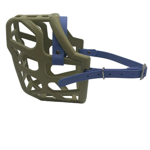 The Muzzle Movement Khaki Taz Dog muzzle with periwinkle straps and nickle hardware on a white background