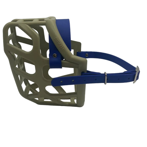 The Muzzle Movement Khaki Taz* dog muzzle with dark blue straps and nickle hardware on a white background