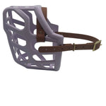 The Muzzle Movement Lilac Taz dog muzzle with light brown straps and brass hardware on a white background