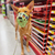 The Muzzle Movement Neli muzzle in lime green with violet biothane strapping on a Podenco 