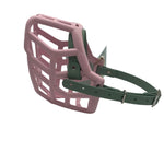 The Muzzle Movement Pastel Pink Rex dog muzzle with sage green straps and nickle hardware on a white background