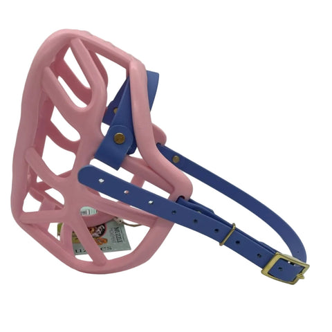 The Muzzle Movement Pastel pink Harry 2.0 dog muzzle with periwinkle straps and brass hardware on a white background