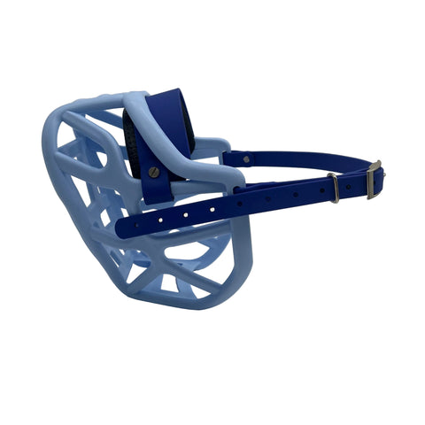 The Muzzle Movement baby blue harry* 2.0 dog muzzle with dark blue straps and a foam noseband 