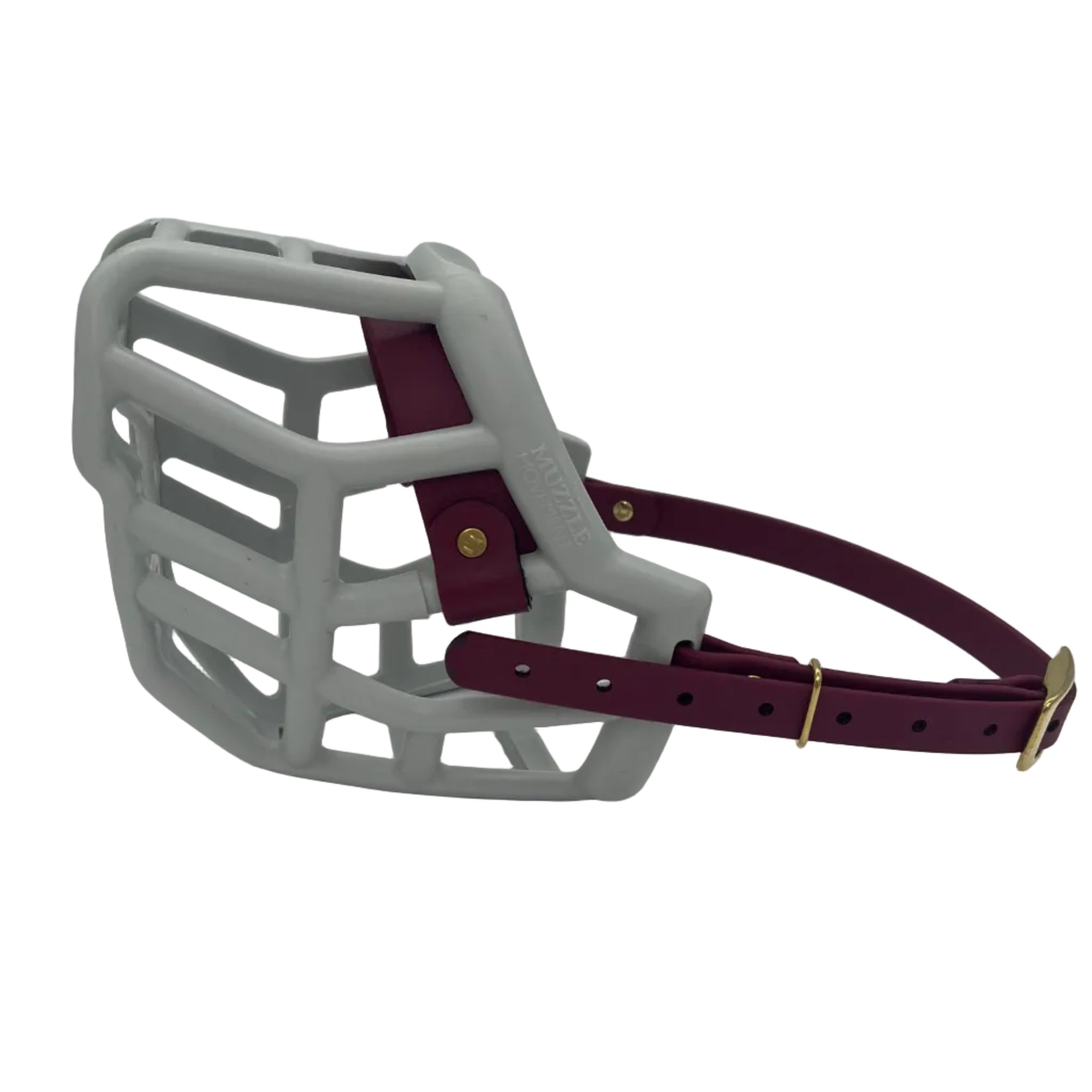 The Muzzle Movement grey Tolly dog muzzle with wine straps and brass hardware on a white background