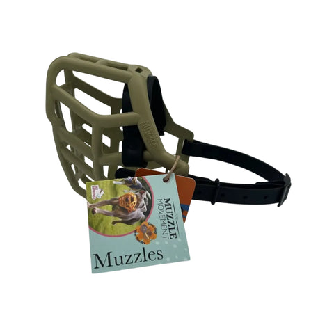 The Muzzle Movement khaki green muzzle with black straps and back hardware on a white background