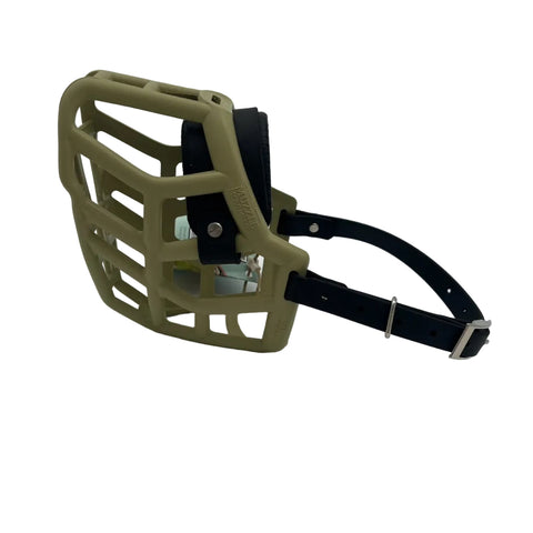 The Muzzle Movement khaki green rex dog muzzle with black strapping a foam noseband and nickle hardware on a white background