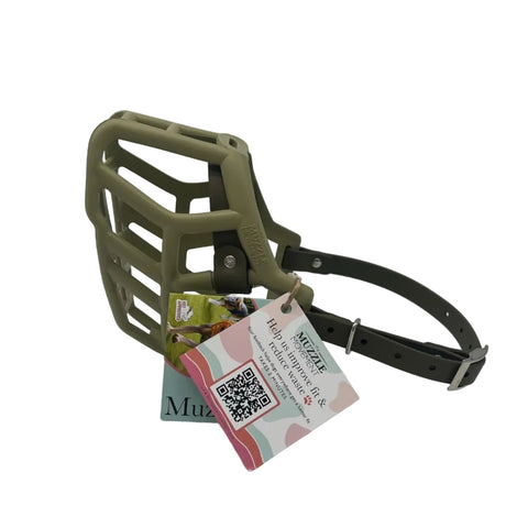 The Muzzle Movement khaki green rex dog muzzle with military olive straps and nickle hardware on a white background