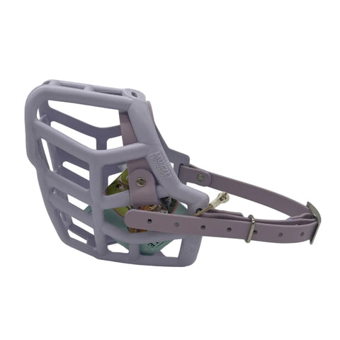 The Muzzle Movement lilac rex dog muzzle with pastel purple straps and nickle hardware on a white background