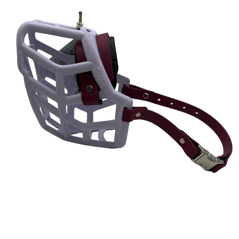 The Muzzle Movement lilac rex dog muzzle with wine straps, foam noseband, quick release and chicago screws