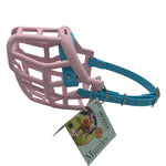 The Muzzle Movement pastel pink Neli dog muzzle with skyan blue straps and nickle hardware on a white background