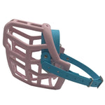 The Muzzle Movement pastel pink Neli* dog muzzle with skyan blue straps and nickle hardware on a white background