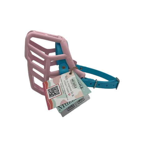 The Muzzle Movement pastel pink rex dog muzzle with skyan blue straps, nickle hardware on a white background