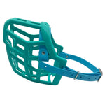 The Muzzle Movement teal Neli dog muzzle with skyan blue straps and nickle hardware on a white background