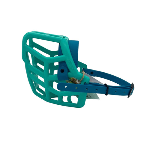 The Muzzle Movement teal rex* dog muzzle with lagune straps and black hardware on a white background
